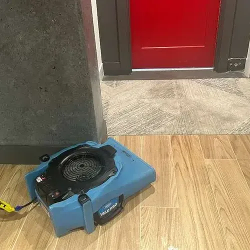 Pasadena water damage drying: an air mover on a tile floor